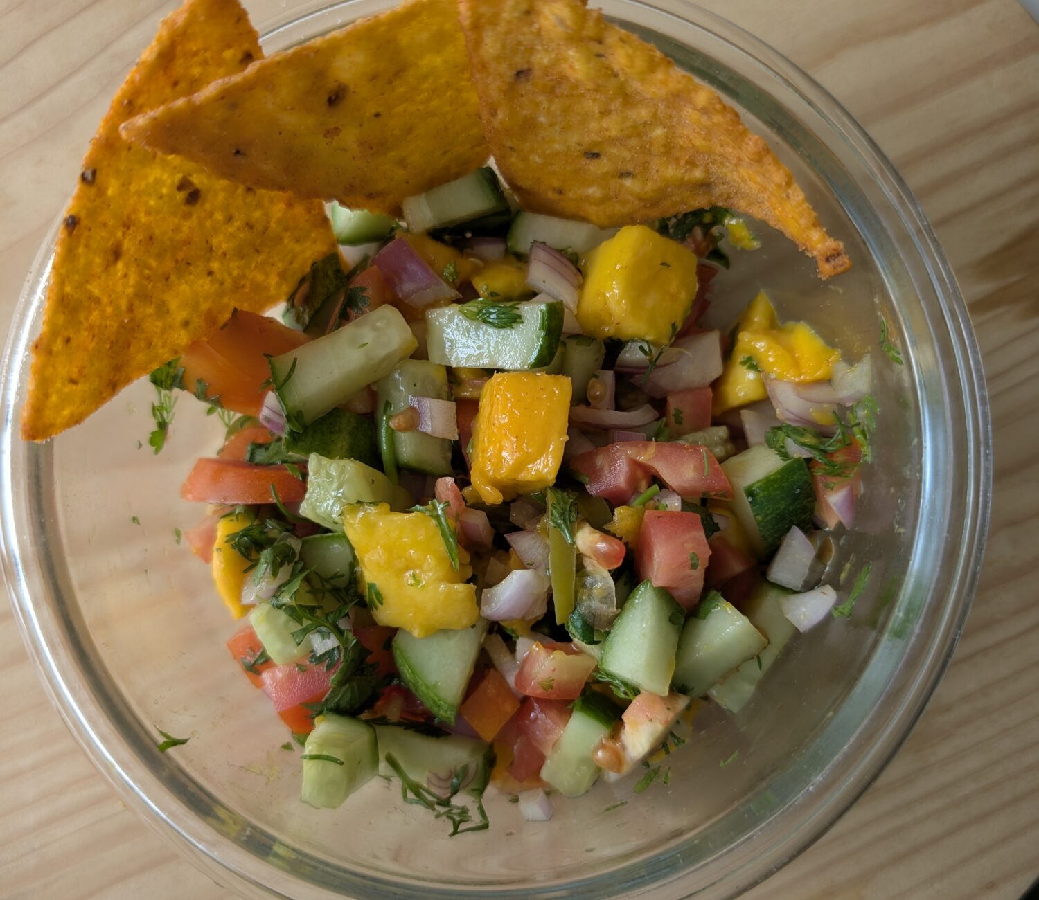mango salsa with chips and iced tea